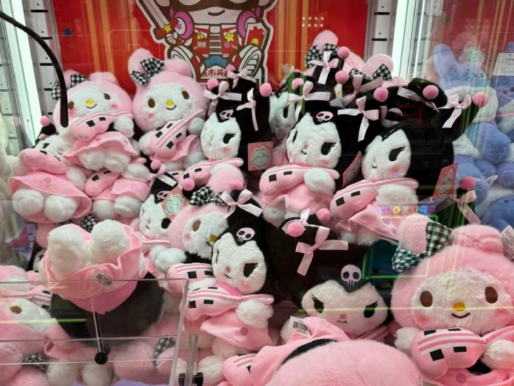 Plush dolls in claw machine